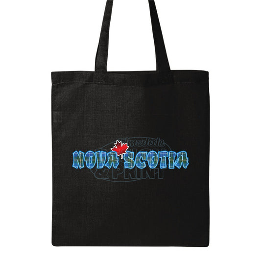 15x16" solid black canvas tote bag with Nova Scotia written in Blue Tartan with a bright red Maple Leaf & bright blue outlines
